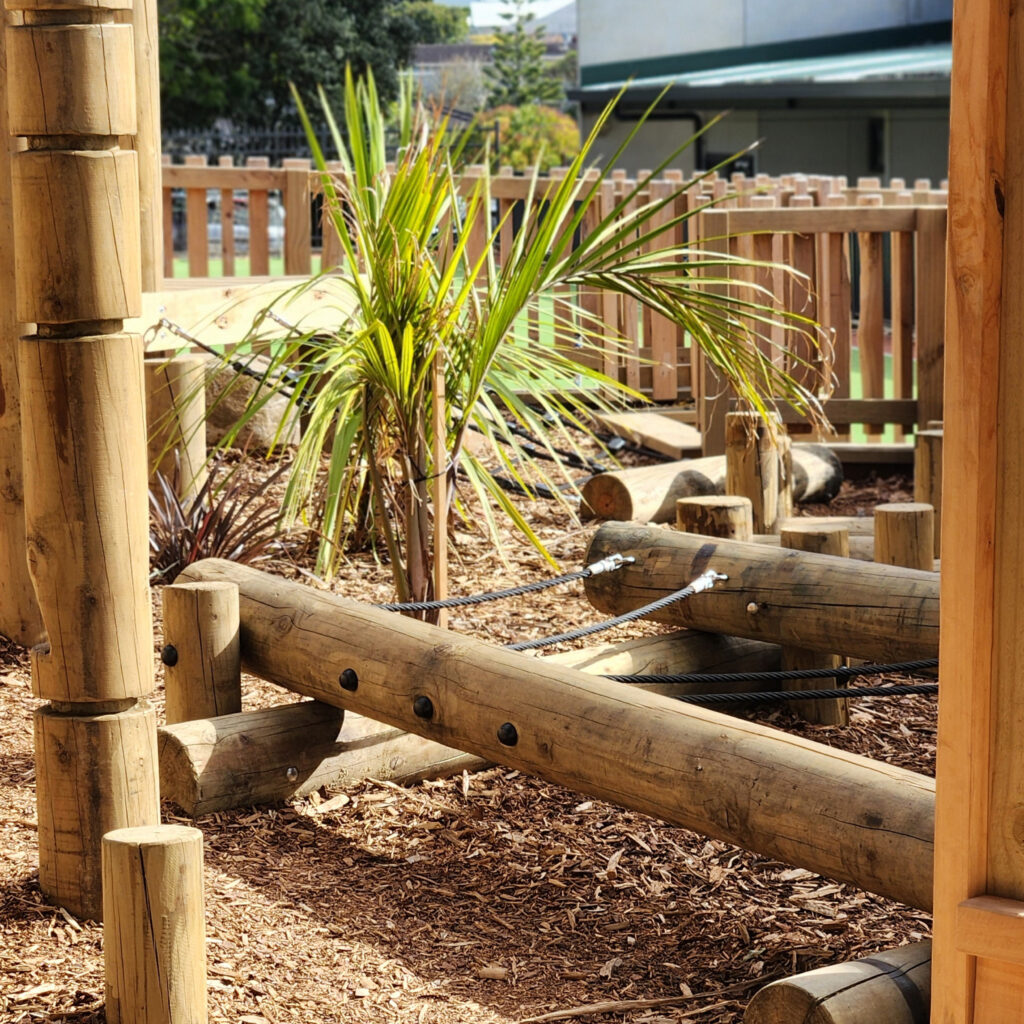 Balance beams and ropes in a natural playground