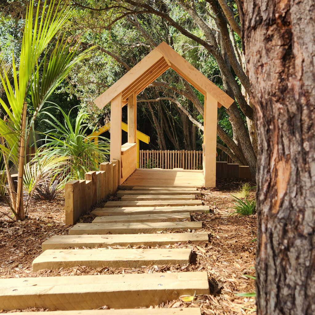 Sleeper pathway leading to a children's play house